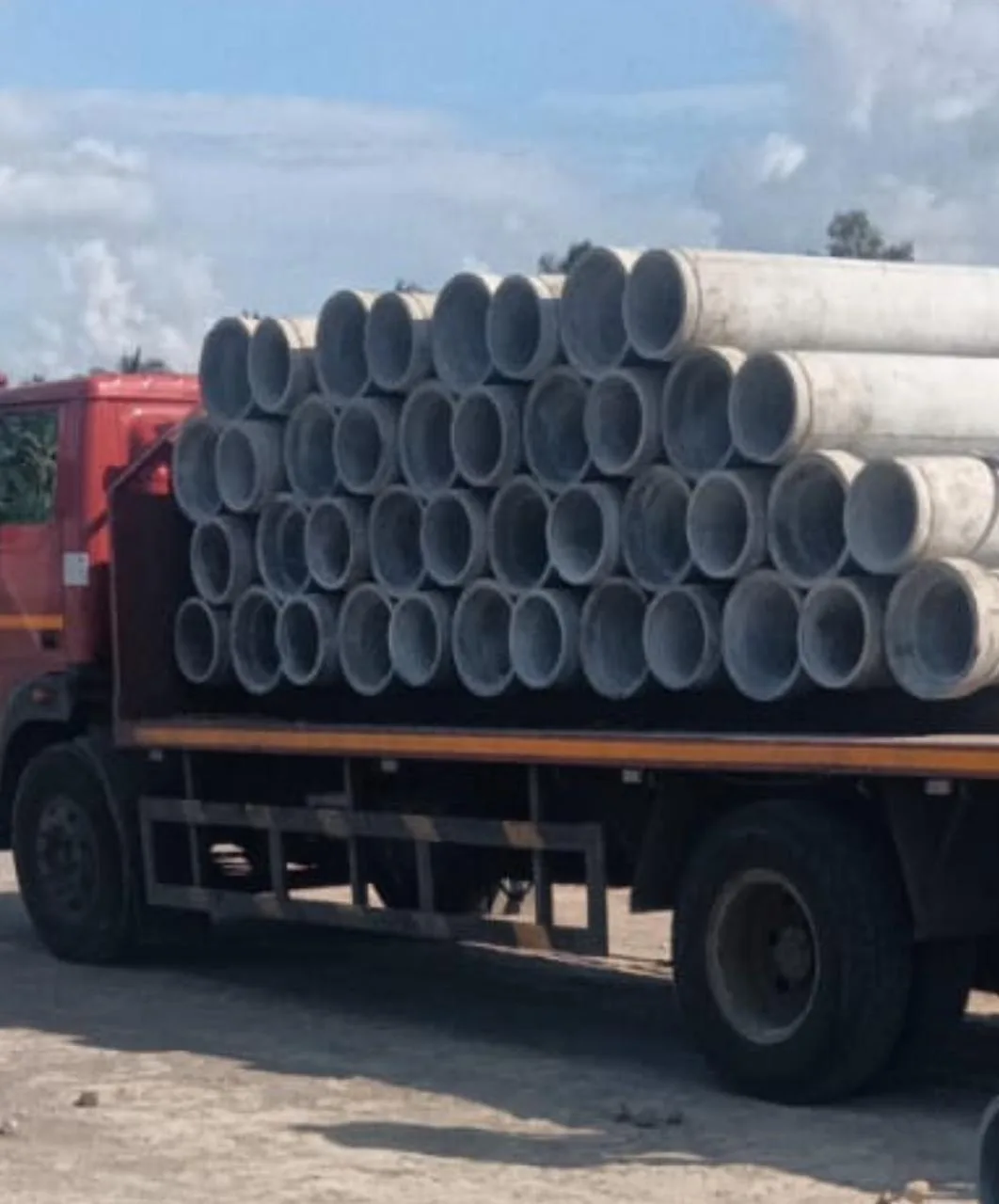RCC pipes loaded on a delivery truck at Gurukrupa Enterprises